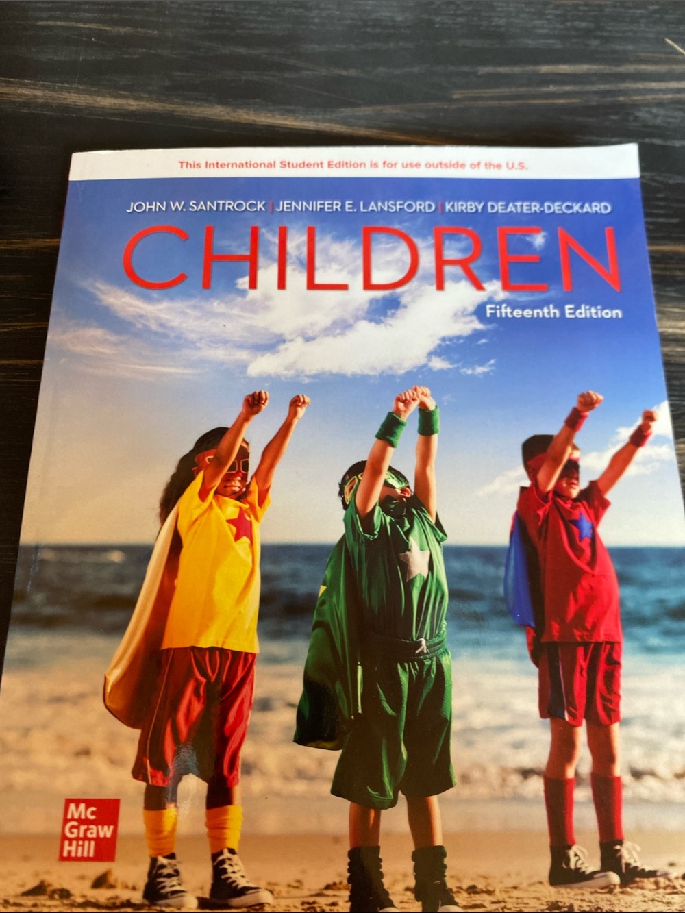 McGraw Hill CHILDREN Textbook with Yellow, Green, Red Superhero Cover